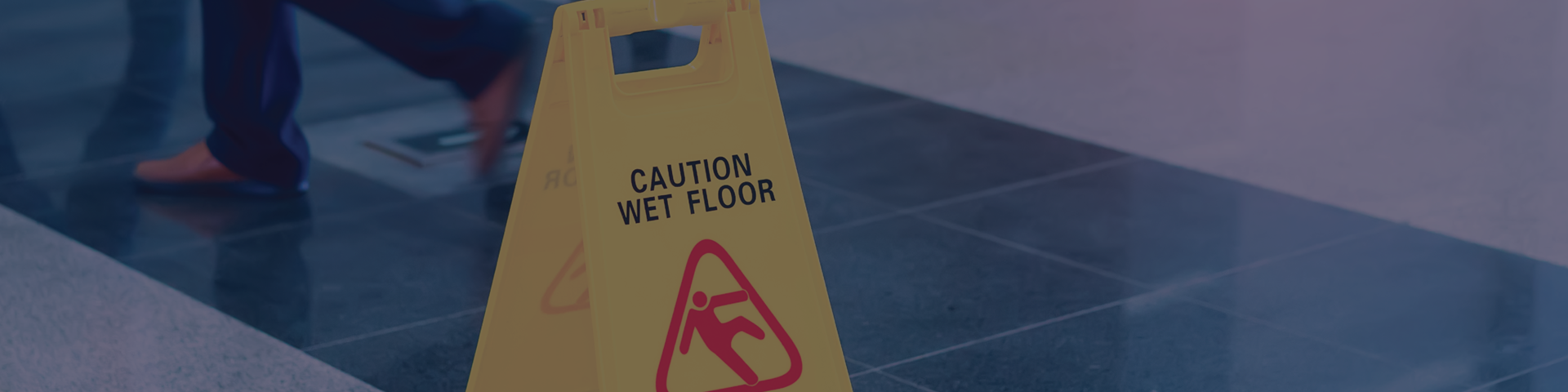 Yellow caution wet floor sign in public area